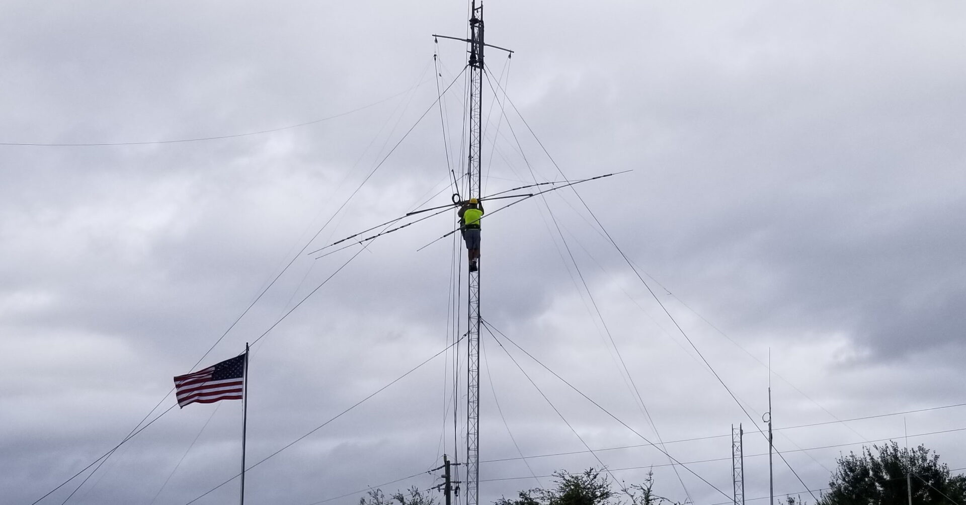Men working on an antenna tower
